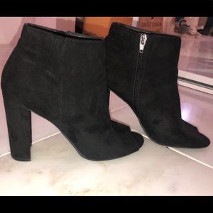 MERONA black ankle boot with open toe and heel.